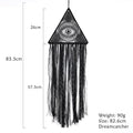 Black triangular evil eye dream catcher with measurement guides beside the frame and fringe, plus printed size and weight labels.