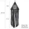 Black triangular evil eye dream catcher with measurement guides beside the frame and fringe, plus printed size and weight labels.