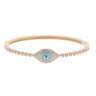 Rose gold tone evil eye bangle with a turquoise blue center and round clear accents on white
