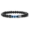 Glossy black beaded bracelet with three blue eye beads and reflective chevron spacers