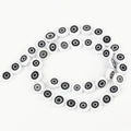 White flat round beads with black and white concentric eye motifs, arranged in a loop