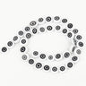 White flat round beads with black and white concentric eye motifs, arranged in a loop
