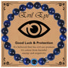 Glossy blue banded bead bracelet with a blue eye bead and silver tone spacers on a printed card