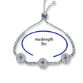 Silver tone three-eye bracelet with a circular guide labeled "maxlength 9in"