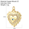 Scalloped gold tone heart charm with a blue eye center and clear inner border, shown with measurement annotations