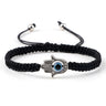 Black knotted cord bracelet with a single dotted silver tone Hamsa and blue eye