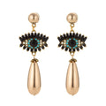 rhinestone evil eye tassel earrings