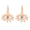 Gold tone open eye drop earrings with pale purple centers, clear accents, radiating lashes and lower star tips.