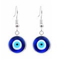 Front view of round blue evil eye drop earrings with silver tone frames and hook ear wires