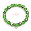 Green evil eye beaded bracelet with an inner perimeter label of 178 mm and a 10 mm annotation beneath a faceted bead