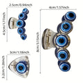 Diagram of three blue evil eye hair claw clip designs with individual centimeter and inch measurement labels