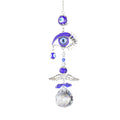 Open silver tone eye with curved lashes, blue beads, wing-shaped detail and a clear faceted ball