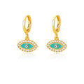 Gold tone hoop earrings with turquoise evil eye charms surrounded by clear accents