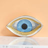 Blue eye tray with fine linework, a broad gold tone outline and a dotted border, front view