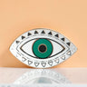 Green eye tray with black triangular border details and a gold tone rim, front view