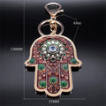 Brown floral Hamsa keychain diagram with a vertical arrow labeled 138MM and a horizontal arrow labeled 55MM.