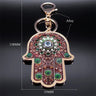 Brown floral Hamsa keychain diagram with a vertical arrow labeled 138MM and a horizontal arrow labeled 55MM.