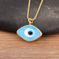 Close-up of the Light Blue necklace option, with a white and blue eye center and gold tone pendant border and chain.