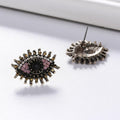 Pink evil eye earrings shown from the front and back, with a straight stud post visible