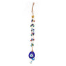 Several tan strands with multicolored eye beads leading to a blue teardrop pendant and lower eye drops