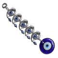 Diagonal view of five linked silver tone eye motifs with blue side beads and a round blue pendant
