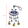Blue evil eye wall hanging with measurement guides for the ornament, eye centerpiece and cord loop