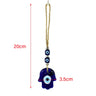 Blue Hamsa evil eye pendant with two cube eye beads, silver tone spacers and a cord loop, shown with dimension arrows