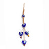 Blue evil eye heart cluster with one upper heart, three hanging hearts and red, yellow and purple accents