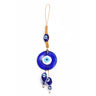 Round blue evil eye hanging with one oval eye above and two oval eye drops below on tan cord