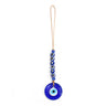 Round blue evil eye pendant beneath a row of six blue eye beads and two blue faceted accents