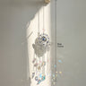 Silver tone Hamsa suncatcher with clear crescent moon drops beside a length marker labeled 39 cm and 15.35 in.