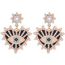 Black heart-shaped evil eye drop earrings with clear accents, pale beaded borders and pearl-like white tops