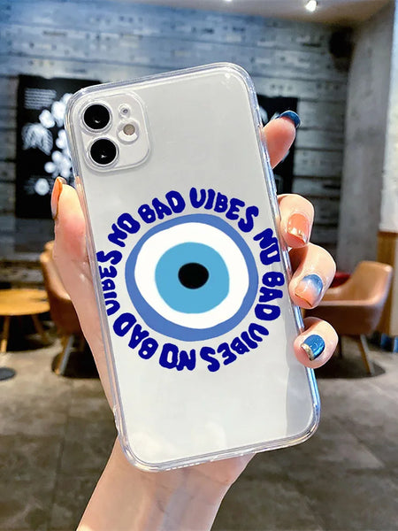 Clear iPhone case held in a hand, with a round blue and white eye surrounded by dark blue NO BAD VIBES lettering.