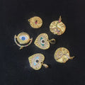 Evil Eye Designer Pendant Charm: Trendy Gold-Colored Jewelry Piece for Earrings, Necklaces, and Bracelets