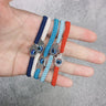 Evil Eye Braided Bracelet with Dotted Hamsa Hand and Beaded Cord Ends
