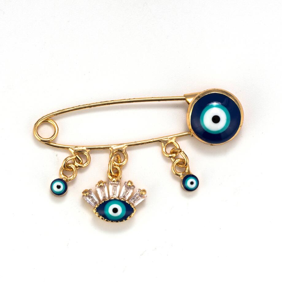 Ward off Bad Luck with our Turkish Evil Eye Brooch Pin with Flower Crown, Hamsa Hand, and Star Charms