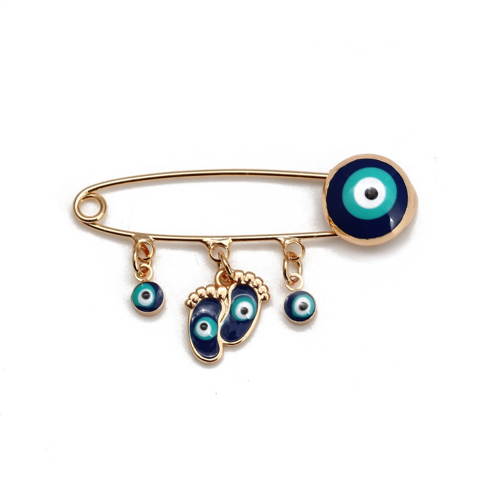 Ward off Bad Luck with our Turkish Evil Eye Brooch Pin with Flower Crown, Hamsa Hand, and Star Charms