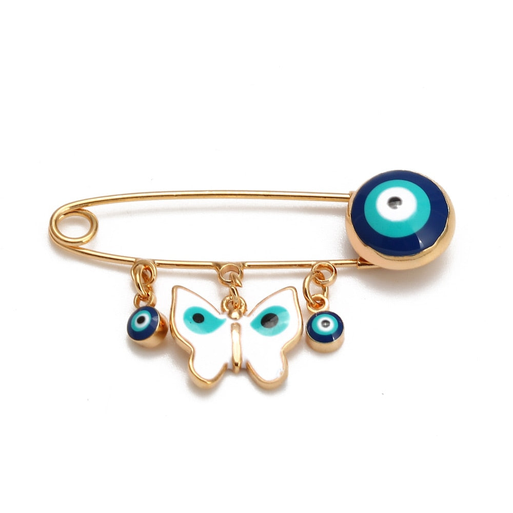 Ward off Bad Luck with our Turkish Evil Eye Brooch Pin with Flower Crown, Hamsa Hand, and Star Charms