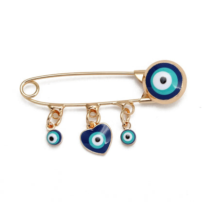 Ward off Bad Luck with our Turkish Evil Eye Brooch Pin with Flower Crown, Hamsa Hand, and Star Charms