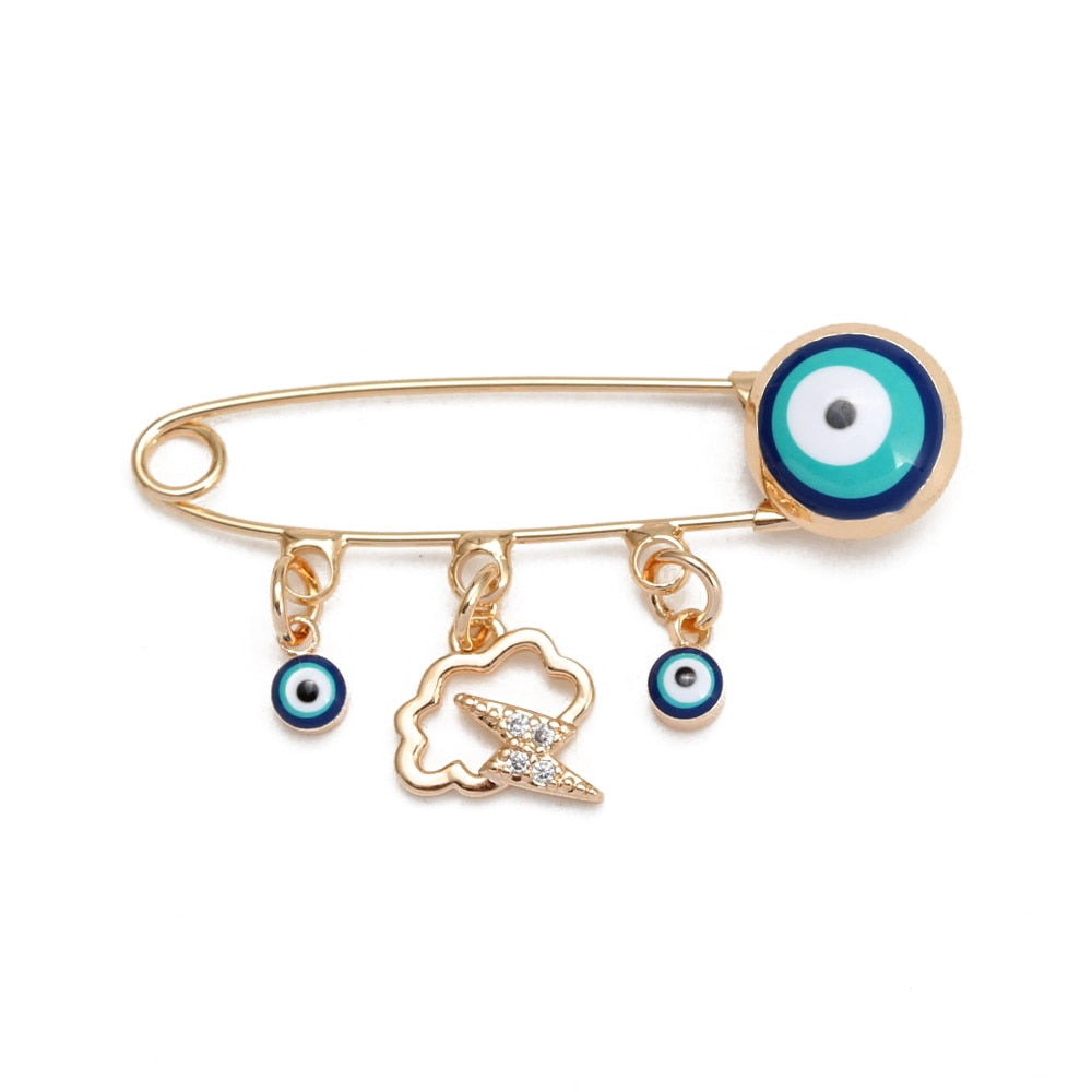 Ward off Bad Luck with our Turkish Evil Eye Brooch Pin with Flower Crown, Hamsa Hand, and Star Charms