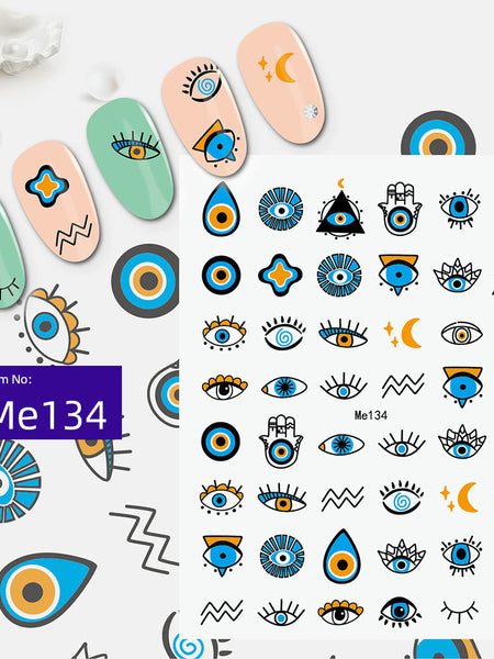 Blue and orange evil eye nail sticker sheet with hamsa, moon and geometric accents