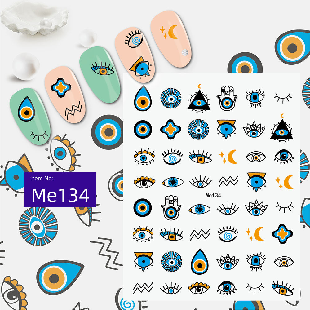 Blue and orange evil eye nail sticker sheet with hamsa, moon and geometric accents
